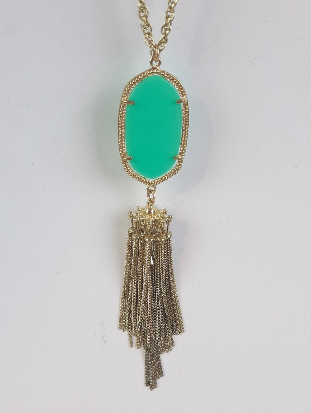 Designer inspired green oval stone and a long metal tassel fashion necklace